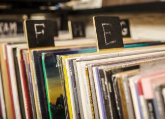 vintage records in crates categorized alphabetically