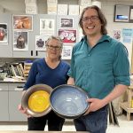 Tim & Kathleen Showcasing Large Ceramic Bowl Raffle Prizes